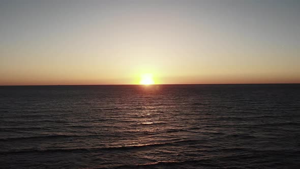 Sunset Over Sea Ocean. Evening Sun Setting with Sky and Sea in Background. Paphos Cyprus Sunset Sea