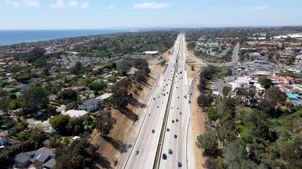 Aerial View of Highway Transportation with Small Traffic and Ocean in the Background San Diego