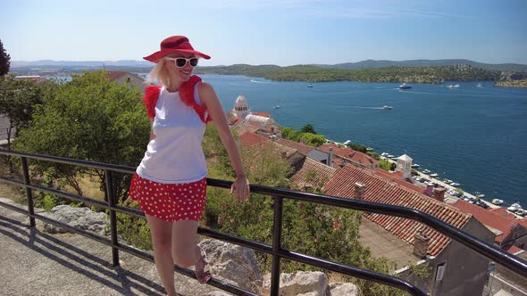 Woman in Sibenik Waterfront in Croatia