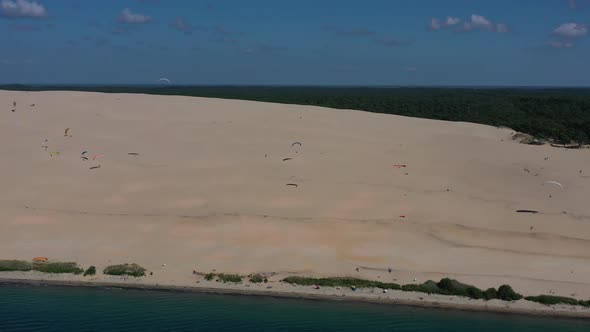 Paragliders Fly Over the Dune of Pilat Dune Du Pilat  Arcachon France