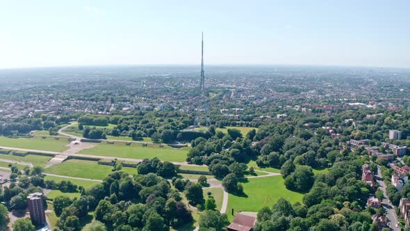 Rising dolly forward drone shot towards Crystal palace radio tower transmitting station