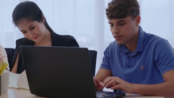 Creative Business People Group Having Conversation at Office Desk in Workplace