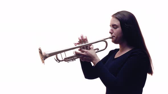 Piccolo Trumpet Player. White Background