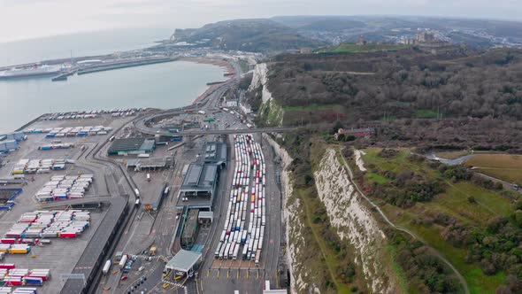 Aerial drone shot of trucks queueing to leave the UK at dover to calais harbour brexit