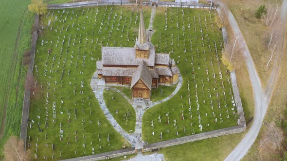 Bird's Eye View On Lom Stave Church In Innlandet County, Norway - aerial drone shot