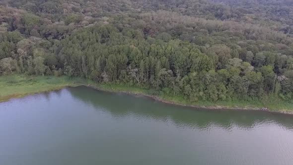 Bali Aerial Forest Slowly Reveal Over Lake