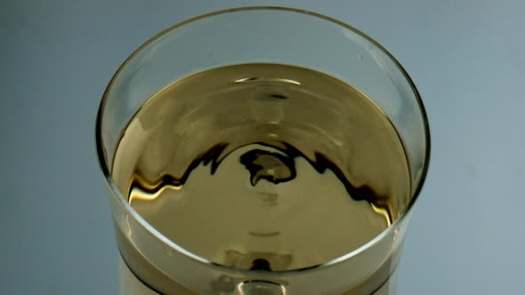 Wine Droplet Falling Glass Goblet