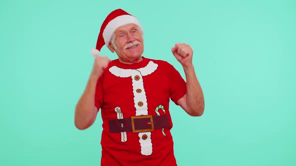 Senior Christmas Grandfather Man Dancing Trendy Dance for Social Media Fooling Around Having Fun