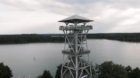 Aerial shot of Wdzydzki Park Krajobrazowy in Kaszuby, Poland with view of observation tower in Wdzyd