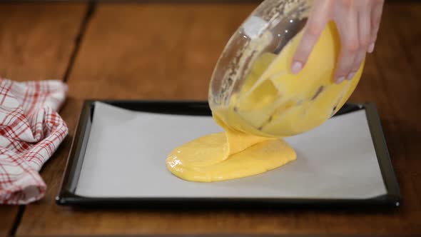 Cake Batter Pouring Into Baking Dish. Home Baking. Baking Cake.