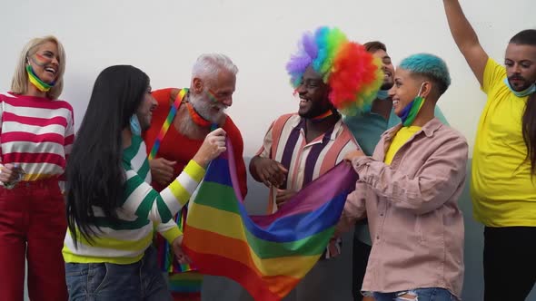 Happy Multiracial people celebrating at gay pride festival