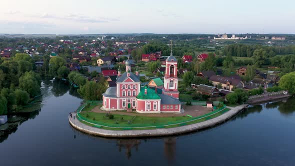 Red church on side of Pleshcheevo lake in Pereslavl-Zalessky