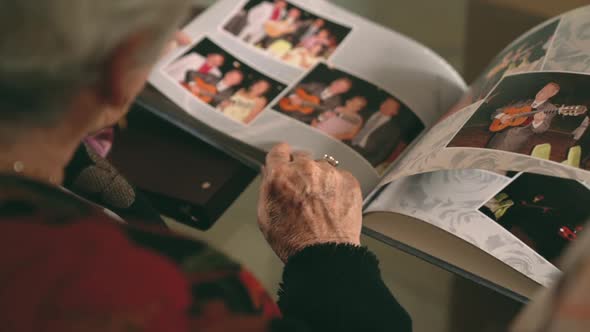 Old woman with photo album