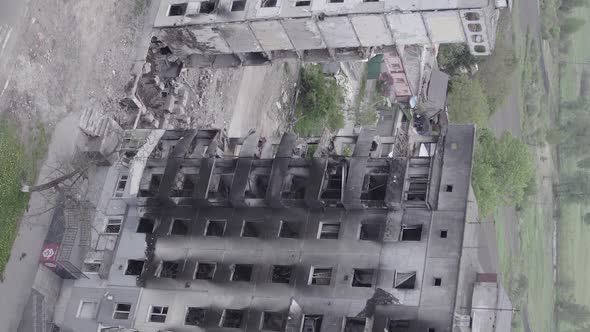 Vertical Video of the Consequences of the War in Ukraine  a Destroyed Building