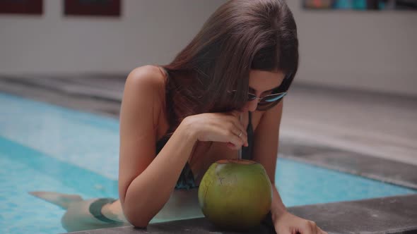 Woman Is Enjoying Holidays in Swimming Pool