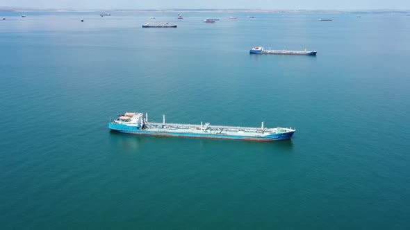 Many Cargo Ships Waiting for Port Entrance