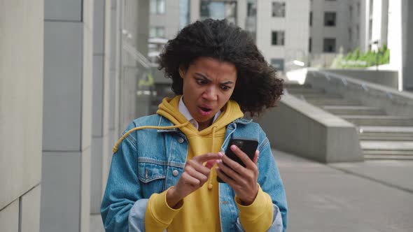 Young Mixed Race Woman Hold Smartphone Read Unpleasant Sms Frustrated By Received Awful News Feels