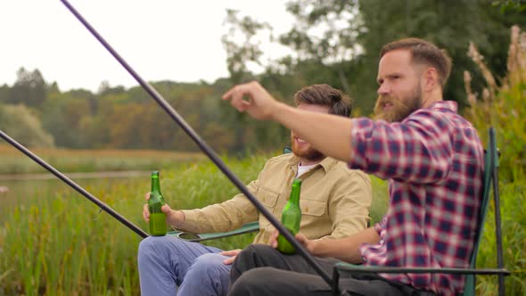 Happy Friends Fishing and Drinking Beer on Lake 40