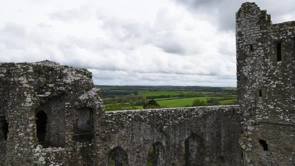 Llawhaden castle ruins, Pembrokeshire in Wales, UK. Aerial pedestal down