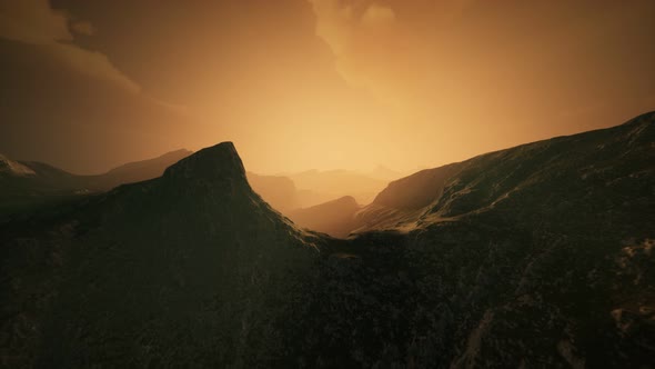 High Mountain Peaks Covered with Dramatic Heavy Fog