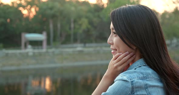 Young woman looking far away at outdoor