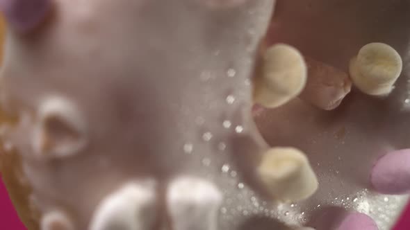 Macro Footage of Gorgeous Donut Hole. Sweets Close-up with White Cream and Marshmallows Different