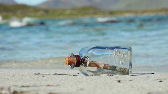 Message in the Bottle Against the Sun Setting Down