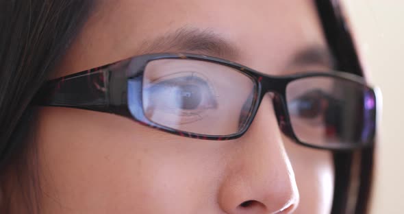 Close up of woman looking at computer