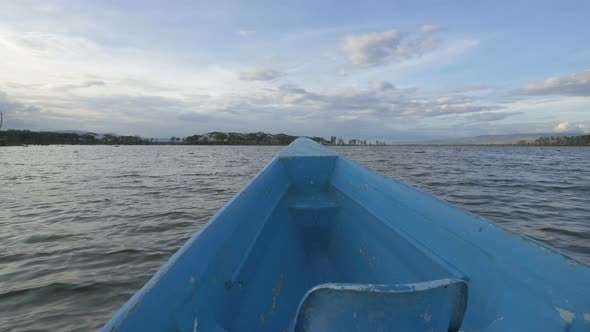 Blue boat sailing on Lake Naivasha