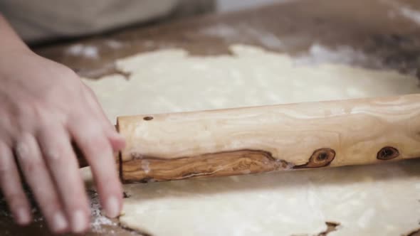 Step by step. Rolling out dough for pie crust.