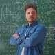 Portrait of Happy Young Man Student Standing in Class with Arms Crossed Smiling Looking at Camera - VideoHive Item for Sale