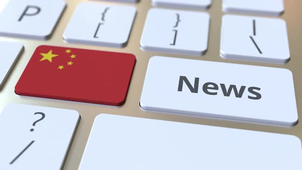 News Text and Flag of China on the Keys of Computer Keyboard