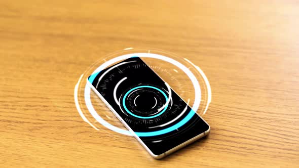 Smartphone with Virtual Circuit Hologram on Table