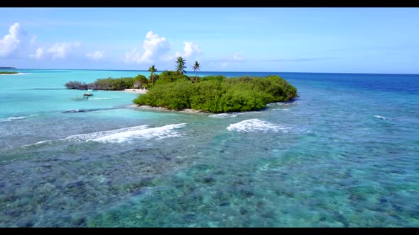 Aerial top down panorama of beautiful shore beach adventure by shallow sea and white sandy backgroun