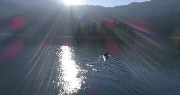 Aerial shot of two friends in canoe, Bavaria, Germany