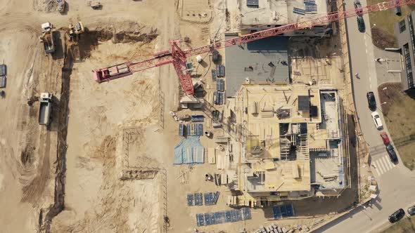 Busy Construction Site and Construction Equipment Aerial.