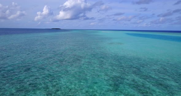 Tropical above clean view of a paradise sunny white sand beach and aqua blue water background in best quality