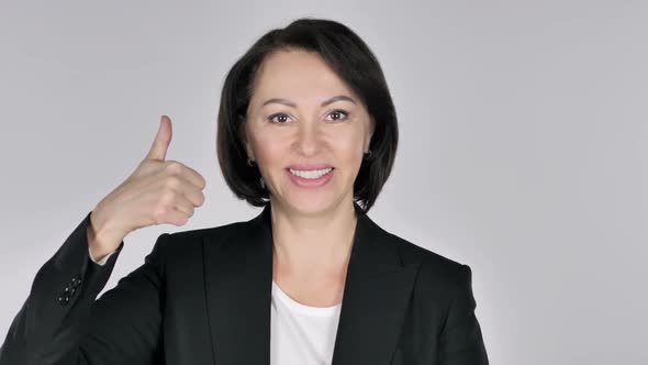 Portrait of Businesswoman Gesturing Thumbs Up