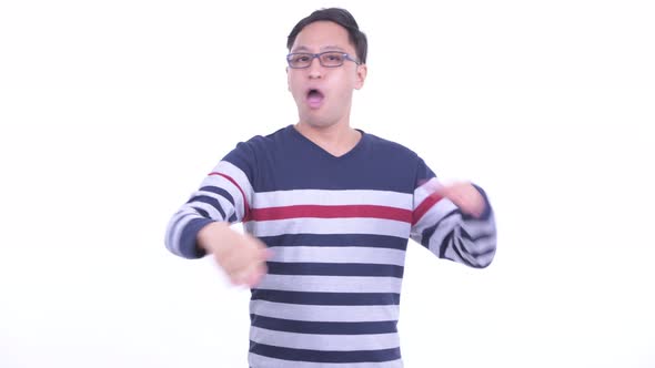 Stressed Japanese Hipster Man Showing Stop Gesture