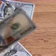Hundred dollar bills falling on table, exchange rate finance and business. - VideoHive Item for Sale