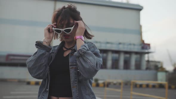 Attractive Beautiful Young Woman Riding Roller Skating and Dancing in the Streets