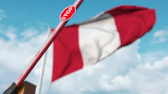 Closing Boom Barrier with Stop Sign at Flag of Peru alt