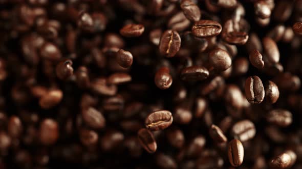 Super Slow Motion Shot of Exploding Premium Coffee Beans Towards the Camera at 1000Fps