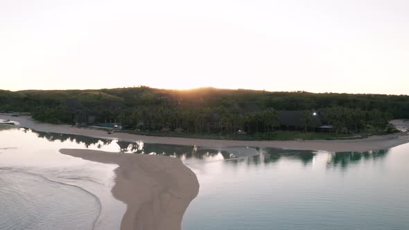 Calm morning at Natadola Bay, pristine paradise lagoon during low tide, aerial