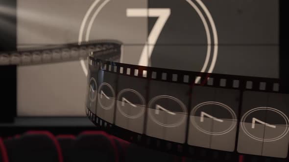 Film Strip Against Cinema Screen with Old Fashioned Countdown Movie