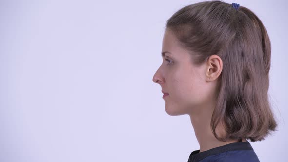 Closeup Profile View of Young Beautiful Businesswoman