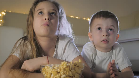 Cute Little Kids While Watching TV