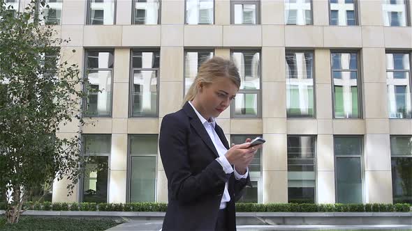 Smiling Businesswoman with Hands Up. Very Emotional Blonde, Slow Motion