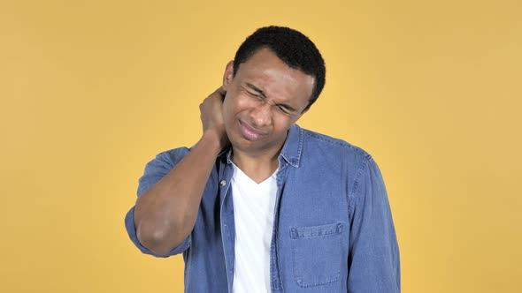 Young African Man with Neck Pain