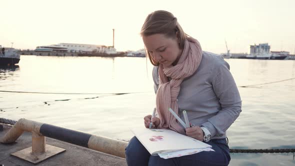 Lovely Artist Sitting By the River.